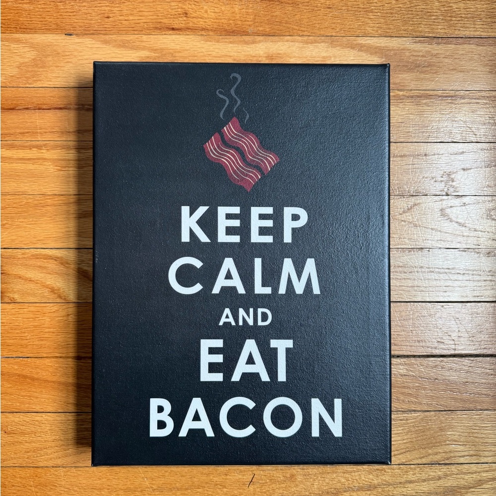 Black and White 'Keep Calm and Eat Bacon' Wall Art  measures 15.5 x 11.5 x 1.75